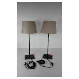 Pair of metal table lamps with blacklight bulbs,