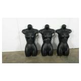 Three female torso mannequin forms, hollow back,