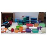 Large group of Tupperware containers and lids