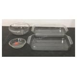 Four Pyrex casseroles/bowls