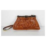 Patricia Nash leather purse with floral design,