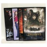 Four movie posters,  GoodFellas, Mean Girls, Lion