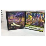 Two puzzles masterpieces 500 piece glow in the