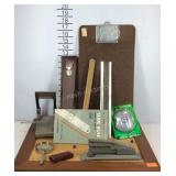 Office supplies, cork board, clip board, stapler,