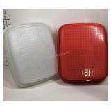 Two Tupperware cake pans