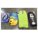 Four used snow boards