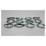 Twelve NFL Packers bracelets