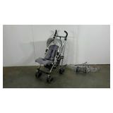 UPPAbaby G-Luxe stroller with clear cover, back