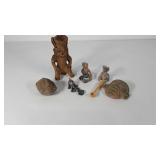 Pottery statues, masks, pewter dog and wooden