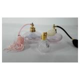 Three glass perfume bottles