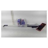 Swiffer WetJet with two bottles of floor cleaner