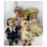 Five porcelain dolls