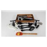 Kitchen utensils including cheese slices, whisk,