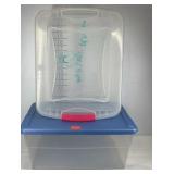 Two sterilite plastic storage containers, one is