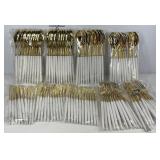 Goldtone and silver tone flatware, four packs of