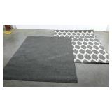 Two area rugs, solid grey and patterned, 60 x 83