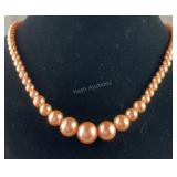 Peach shell pearl stud earrings and 20 inch