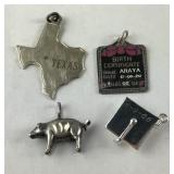 Four sterling silver charms, 11.6grams