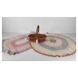 Basket of scatter rugs, round measures 32"