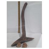 Three Wooden eggs and a piece of driftwood