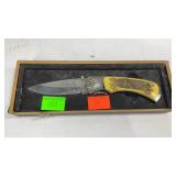 Eagle carved pocket knife