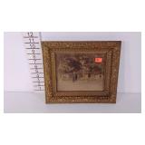 Framed old timey photograph, two ladies and a man