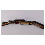 Four train cars, 3 American Flyer,