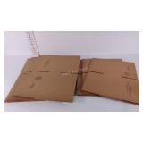 Seven boxes,  two different sizes, four 12 x 12 x