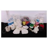 Group of doilies and crochet yarn, vanity box