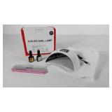 UV LED nail lamp with supplies, new in box,