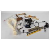 Tools, large wire tie straps, glue gun, saw