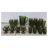 Green Fostoria Glassware group, pitcher, seven 6"