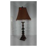Lamp, heavy metal with partial beaded shade. 37"