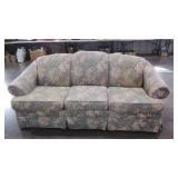 Three cushion sofa, 84" wide, faded