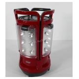 Coleman battery operated lantern in stand, four