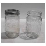 Two Jars, clear glass, quart size, one lid only.