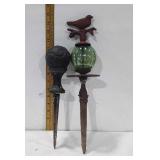 Two iron decorations.   Possible fence