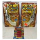 Two Wild West toy cap pistols with super bang