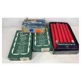 Assorted candles, patrician slate blue, red, and