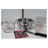 Kitchenware measuring cups, knife, bottle opener,