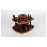 Pipe stand with tobacco jar and six pipes