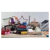 Group of baskets, books, rulers, heart lights,