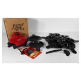 Xpress Redi Set Go cooker with eight pans, works