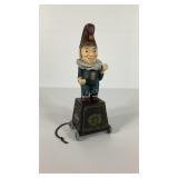 Cast iron Punch 5 cent cigar bank on wheels