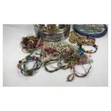 Tin with costume jewelry