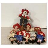 Raggedy Ann dolls, including a doll size bike