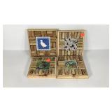 Four cork and ceramic tile trivets