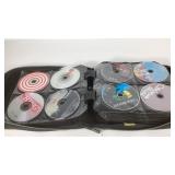 Music CDs, binder full, artists include Janet
