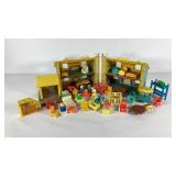 Fisher-Price playhouse with lots of little people