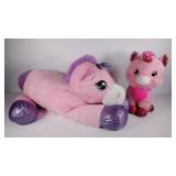 Two plush unicorns, the big one measures 3